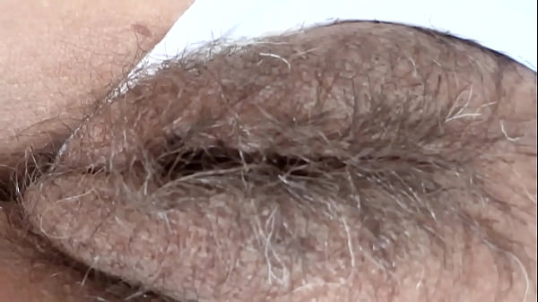 My stepson jerks off while watching my hairy pussy. He cums again and again. He wants to fuck me.